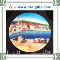 Resin wall plaque with boat and seaside village design